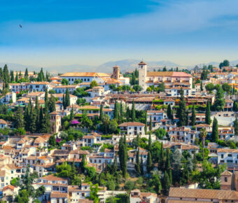Scenic view of the historic Albayzín neighborhood in Granada, Spain, showcasing its charming Arabic architecture and narrow streets