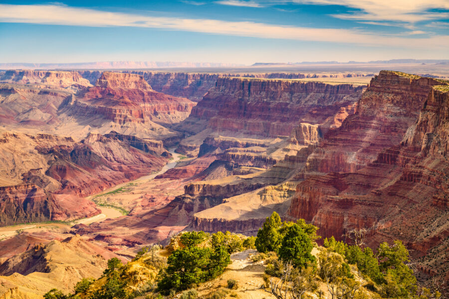 Panoramic view of the Grand Canyon showcasing its vast landscape and layered rock formations in Arizona, USA