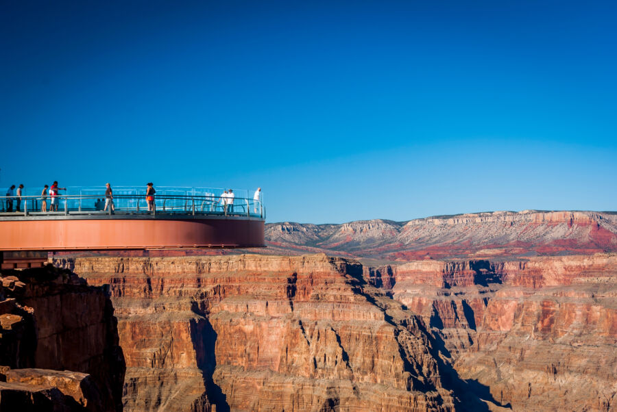 Expansive vista of the Grand Canyon Skywalk, featuring the stunning canyon scenery and the glass walkway