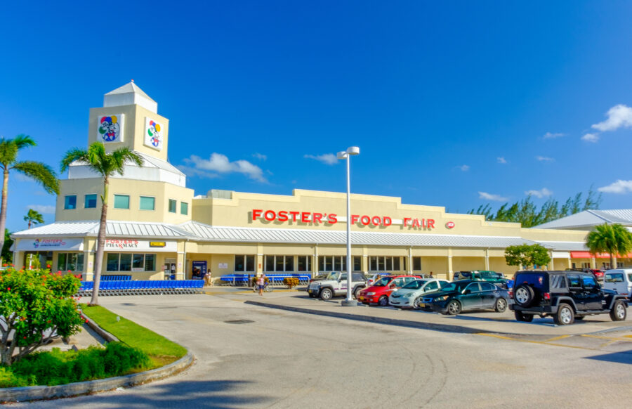 Cars parked in front of Foster's supermarket, one of the four main supermarkets in Grand Cayman, Cayman Islands. 