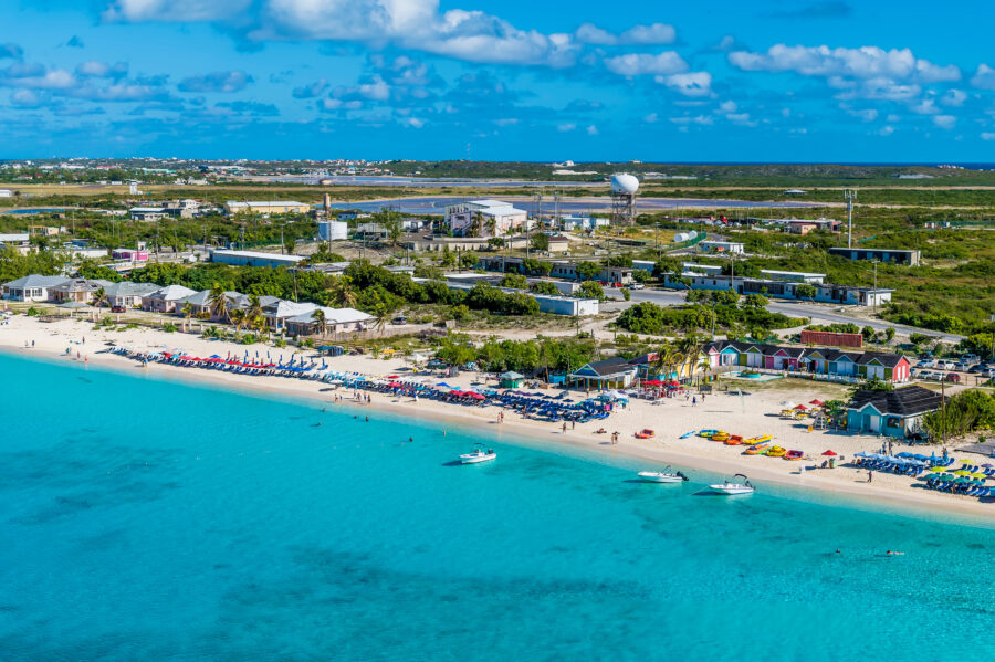 Aerial view of the resort and airport on Grand Turk Island under a sunny sky, Turks and Caicos.

