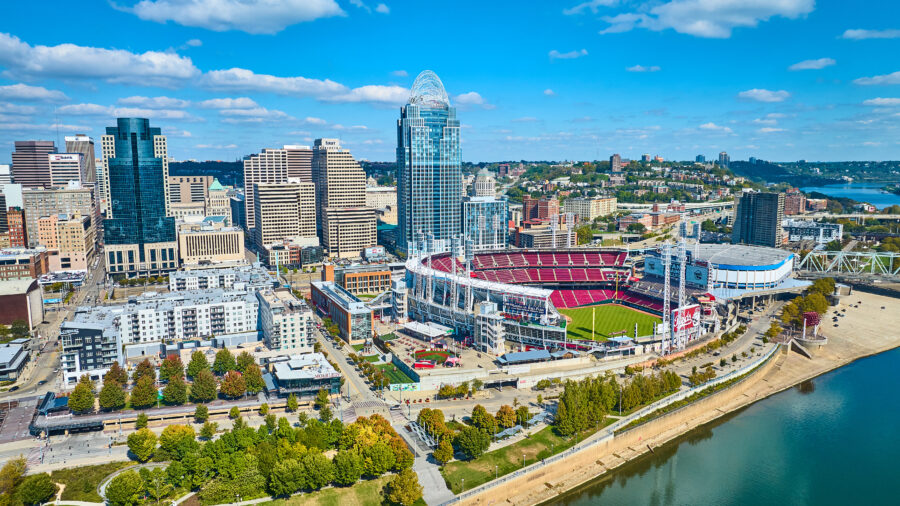 Aerial view of Cincinnati skyline featuring Great American Ball Park, showcasing city buildings and the river