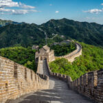 Panoramic view of the Great Wall of China in Beijing, showcasing its majestic structure against a scenic landscape