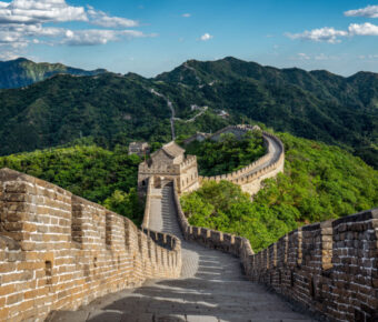 Panoramic view of the Great Wall of China in Beijing, showcasing its majestic structure against a scenic landscape