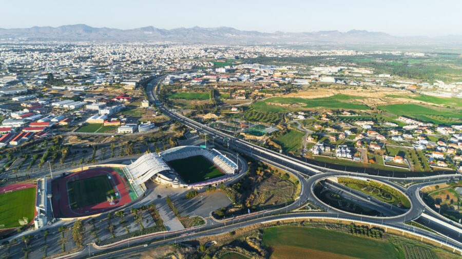 Aerial view of GSP football stadium, highway A1, and a roundabout in Latsia, Nicosia, Cyprus