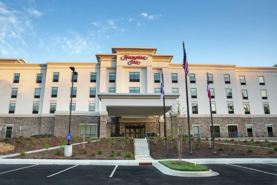 Hampton Inn and Suites in Black Mountain, North Carolina, features modern architecture and a welcoming entrance.