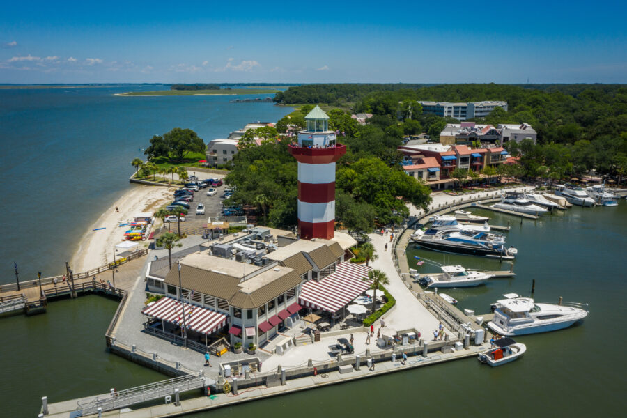 Scenic view of Harbor Town, featuring a lighthouse and marina on Hilton Head Island, South Carolina.
