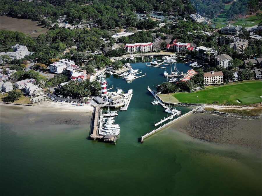 Aerial view of Hilton Head Island, showcasing a marina and the surrounding town in South Carolina.
