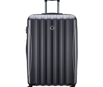 Large graphite hard-shell suitcase with spinner wheels and telescoping handle.