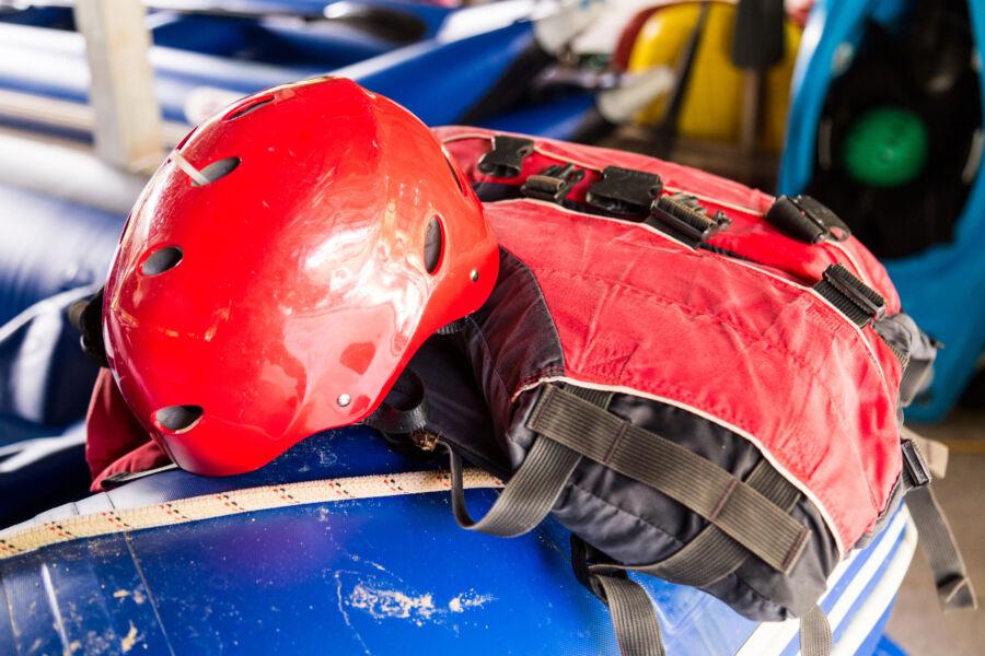 Safety helmet and life jacket, vital components of a safety kit for canoeing and kayaking excursions