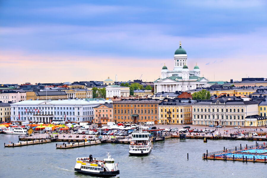 The cityscape of Helsinki highlights the majestic Helsinki Cathedral alongside the vibrant Market Square
