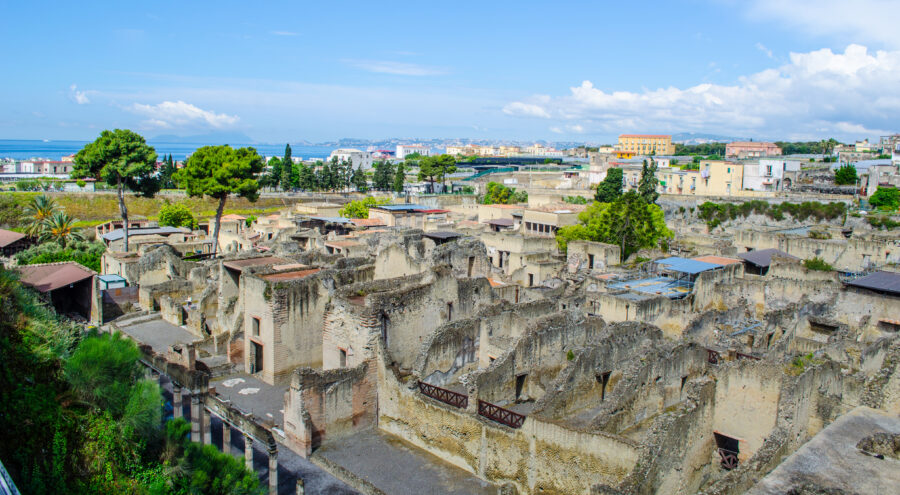 Archaeological site of Herculaneum in Naples, Italy, featuring well-preserved ruins from the ancient Roman city.