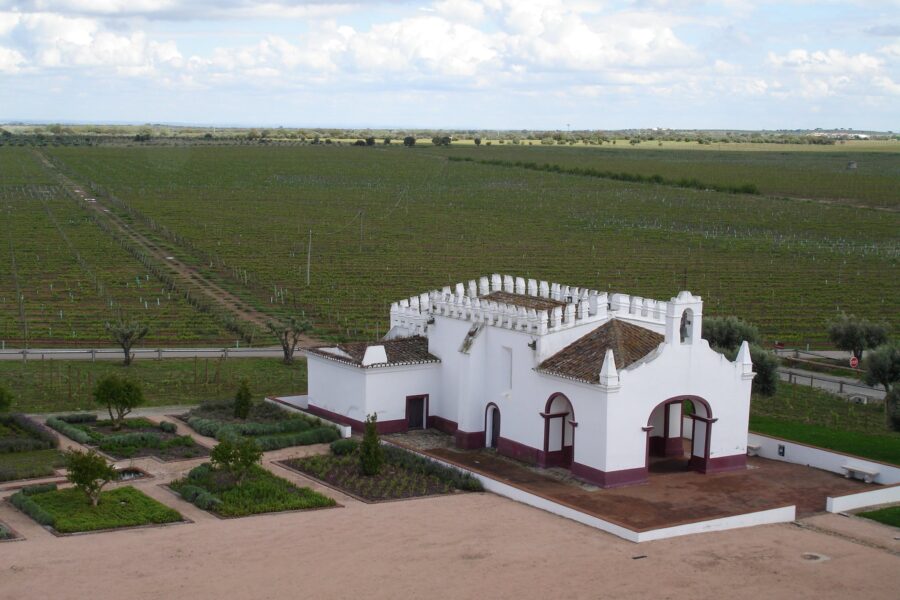 White building with a roof, Santuário de Nossa Senhora dos Remédios, Herdade do Esporão, Portugal.