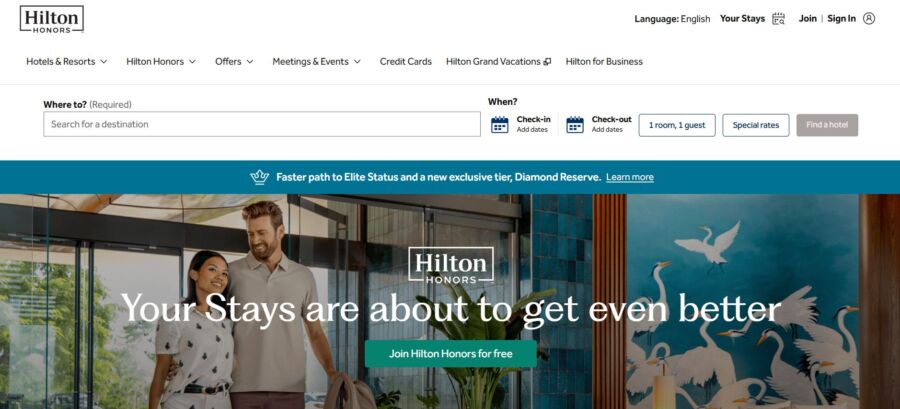 Hilton Honors webpage with a central banner featuring a smiling couple entering a hotel. Text reads, "Your Stays are about to get even better." A blue heron mural is visible.