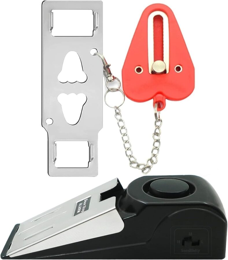 Red and black keychain featuring a metal key, part of the HNHMT Portable Door Alarm & Lock Set.