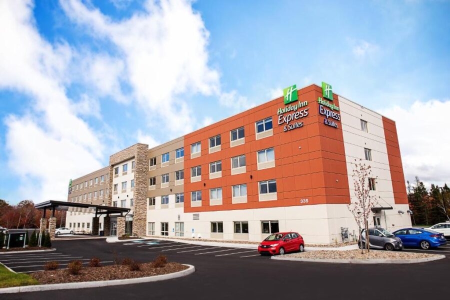 Holiday Inn Express hotel and suites exterior in Greenville, New York, featuring modern architecture and welcoming entrance.