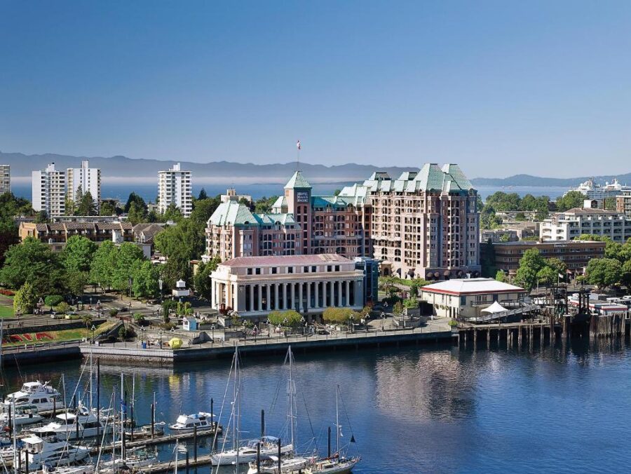 The Hotel Grand Pacific, a modern waterfront hotel with stunning views of the harbor and city skyline.