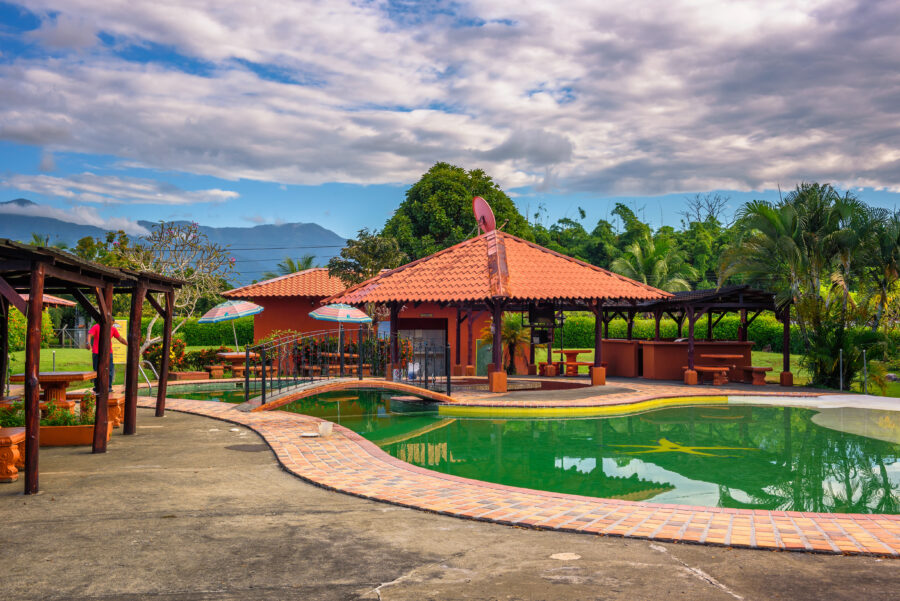 Outdoor swimming pool at Hotel Rancho Leon, Quepos, Costa Rica, located close to Manuel Antonio National Park