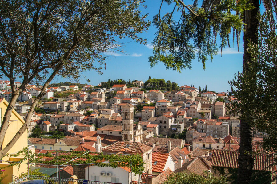 Scenic view of Hvar, Croatia, showcasing the town's charming architecture and vibrant blue sea