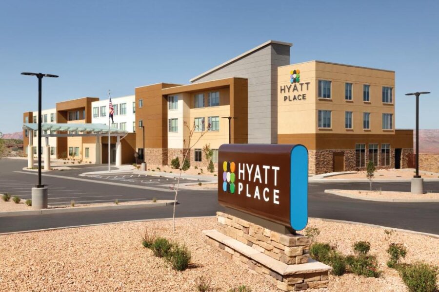 Exterior of Hyatt Place Page Lake Powell, highlighting the hotel's modern style against a natural backdrop.


