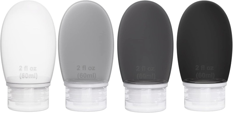 Four colorful imuviy travel squeeze bottles of varying sizes filled with liquid, arranged together on a neutral background.