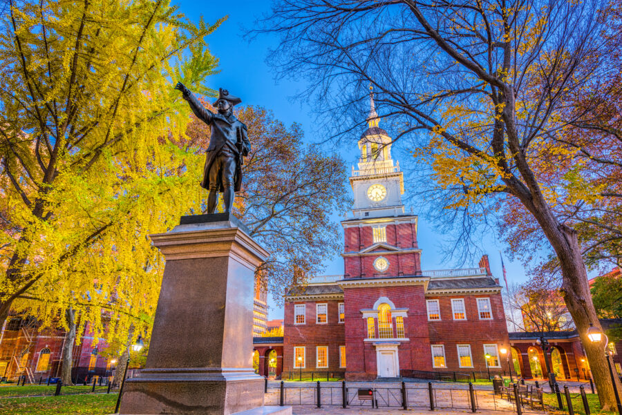 Independence Hall in Philadelphia, Pennsylvania, showcasing its historic architecture and surrounding green space.