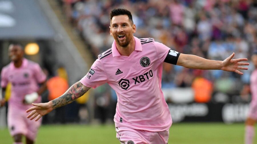 Lionel Messi celebrates goal for Inter Miami during intense soccer match.