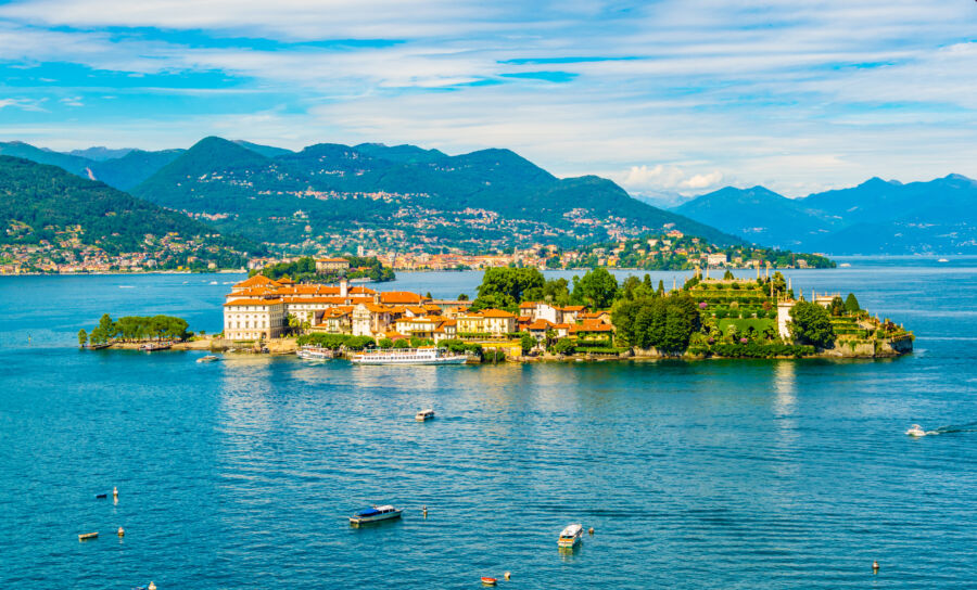 Scenic view of Isola Bella, a picturesque island on Lago Maggiore, Italy, featuring lush gardens and historic architecture.