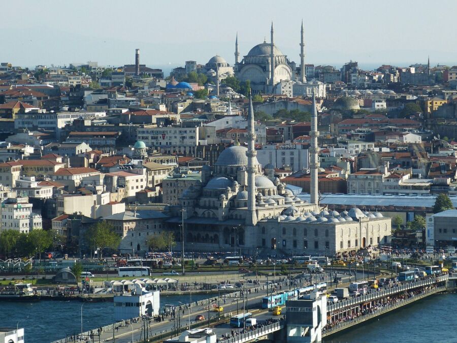 A panoramic view showcasing Istanbuls architectural landmarks, vibrant cityscape, and bustling waterfront.