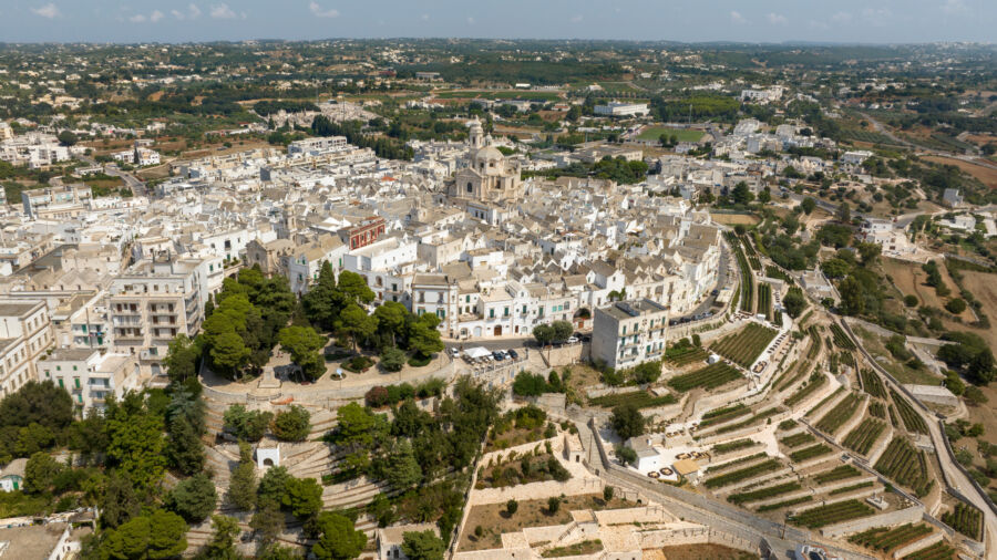 Aerial view of Locorotondo's historic center, showcasing its hilltop location in the Itria Valley, Puglia, Italy