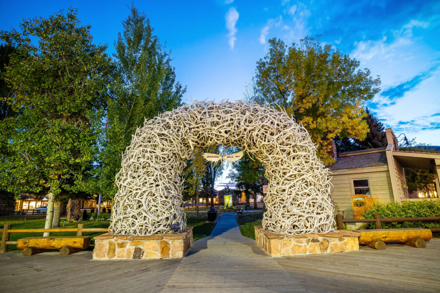 Majestic elk antler arches rise above Jackson Hole, Wyoming, creating a striking natural landmark in the landscape