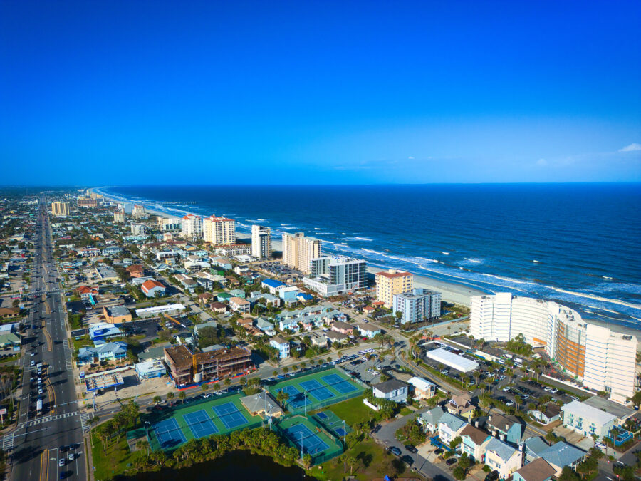 Scenic panorama of Jacksonville Beach, Florida, featuring sunlit shores, rolling waves, and a vibrant coastal atmosphere.
