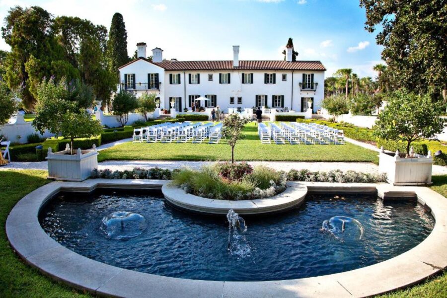 Wedding venue in front of the large white mansion at Jekyll Island Club Resort, Georgia.