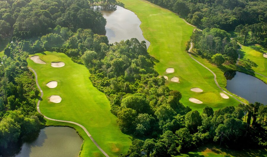 Jekyll Island Golf Club, a scenic golf course in Jekyll Island, GA, surrounded by lush greenery and historic architecture.
