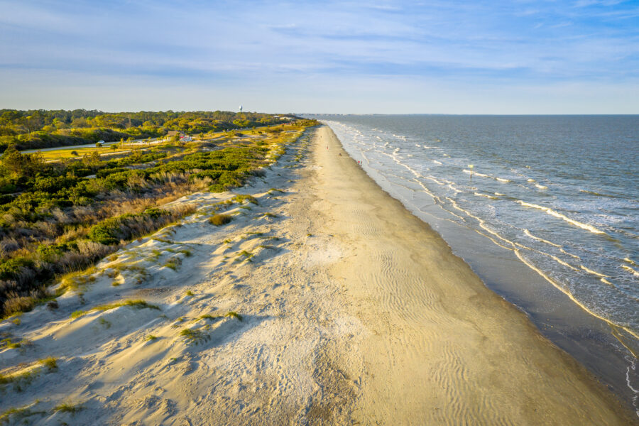 Panoramic aerial view of Jekyll Island featuring vibrant landscapes, coastal shores, and serene waterways