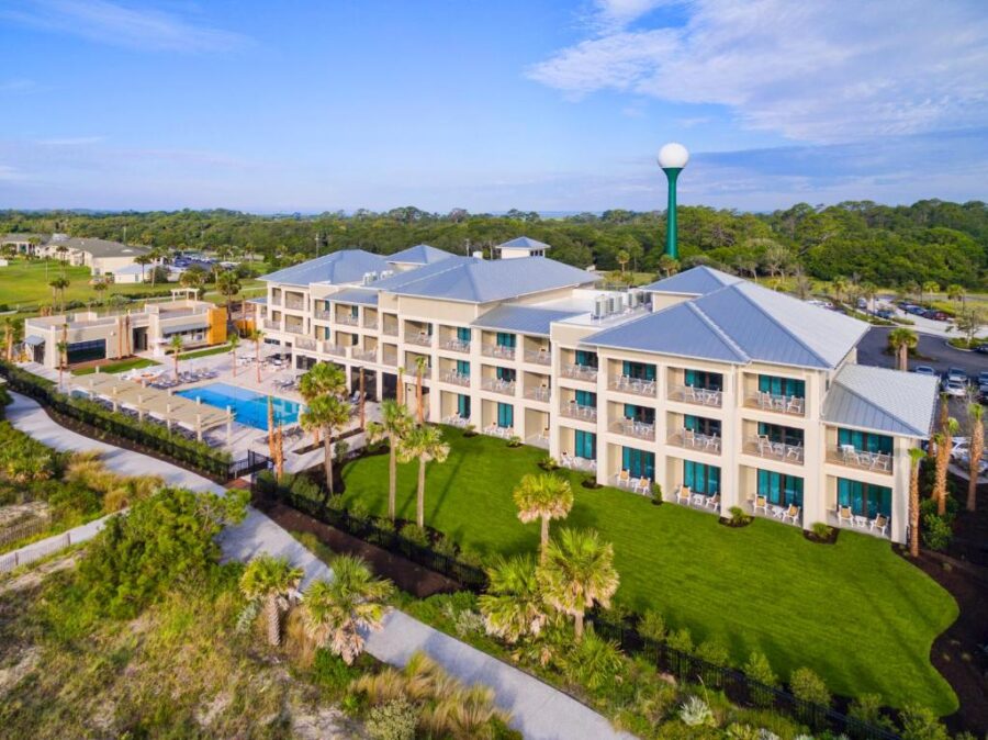 Oceanfront view of Jekyll Oceanfront Resort at Hilton Head, SC, showcasing beach access and resort amenities.
