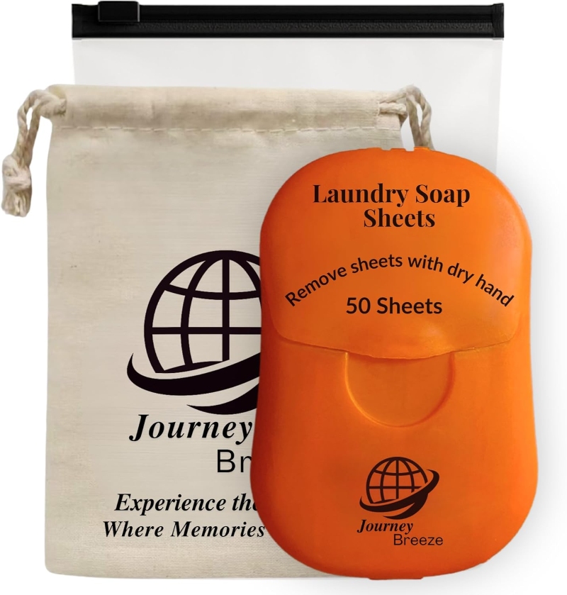 Orange container marked "Laundry Soap Sheets" with 50 sheets, next to a drawstring pouch featuring a globe logo and the brand name "Journey Breeze."