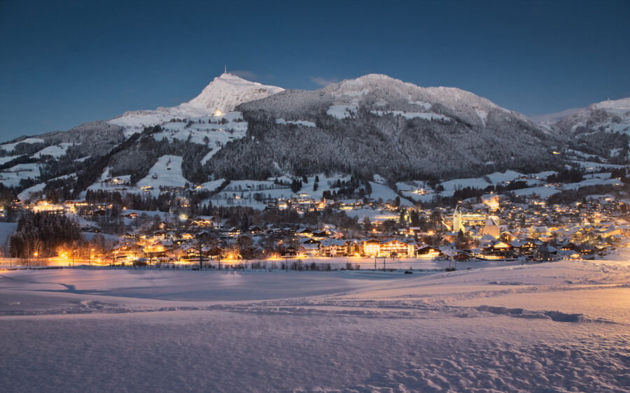 Aerial view of Kitzbühel, Tyrol, Austria, showcasing its charming architecture and stunning alpine landscape