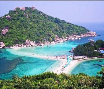 Crystal blue waters in an aerial shot in Koh Tao