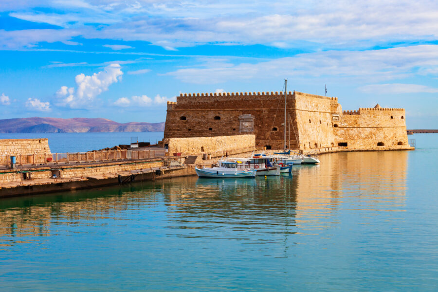 Koules Fortress, a historic Venetian castle, stands prominently in Heraklion, Crete, overlooking the harbor and sea.