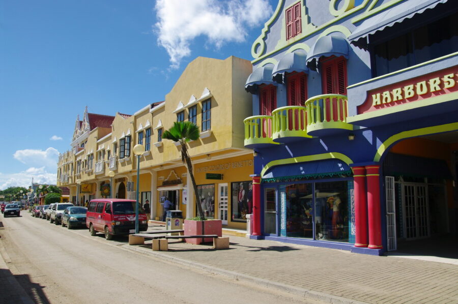 Colorful structure in Kralendijk, Bonaire, displaying a noticeable sign on the front.