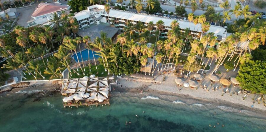 Rooftop view showcasing the pool and beach at Hotel Catedral La Paz, located in La Paz, Baja California Sur, Mexico.