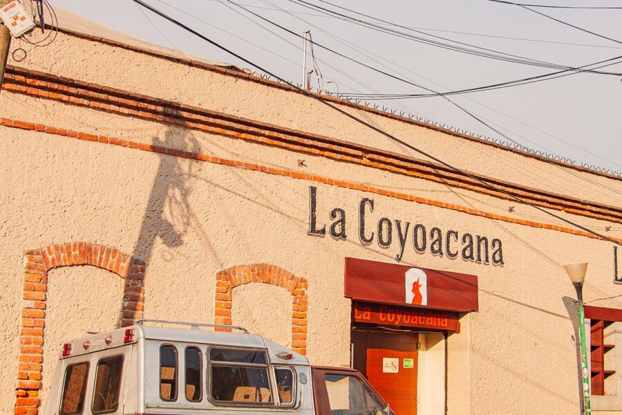 Charming La Coyoacana building, Mexico City, displaying traditional architecture with rustic and cultural accents.