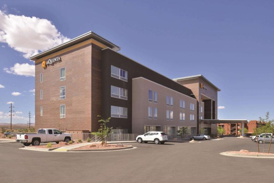 Exterior rendering of La Quinta by Wyndham Page at Lake Powell, highlighting the hotel's architectural features.
