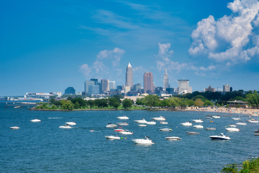 Lake Erie in Cleveland, Ohio, featuring tranquil waters and a picturesque shoreline under a bright sky