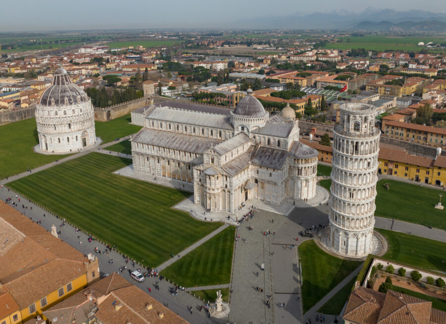 Aerial view of Piazza dei Miracoli, featuring the Leaning Tower of Pisa, cathedral, and baptistery.