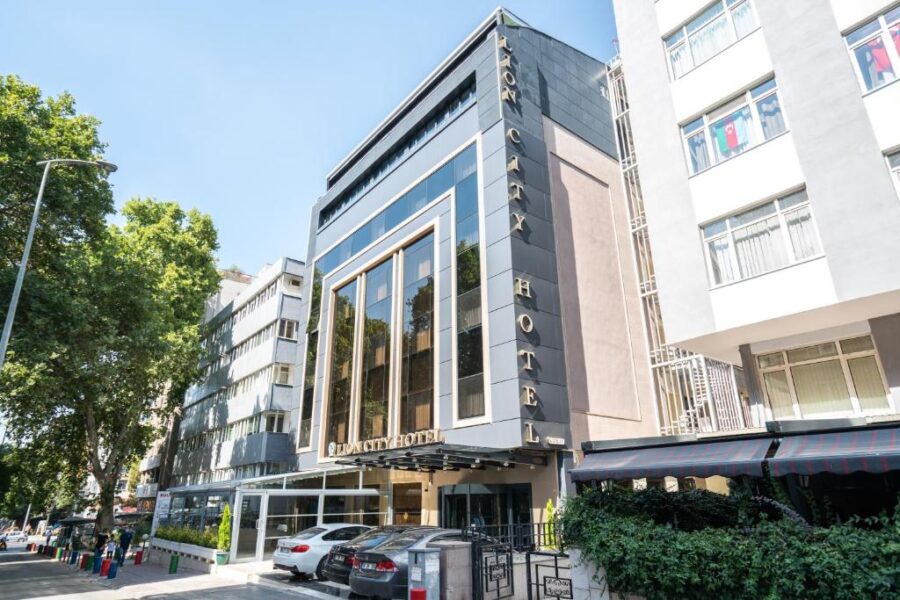 Lion City Hotel Kizilay situated at the corner of a street, showcasing its prominent location and architectural design.