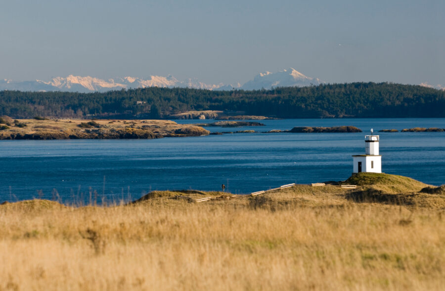 Cattle Point light with views of Lopez Island and the Cascade Mountains in the San Juan Islands, Washington