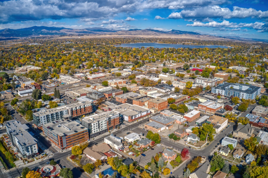 Aerial view of Loveland, Colorado showcasing vibrant autumn colors across trees and landscape