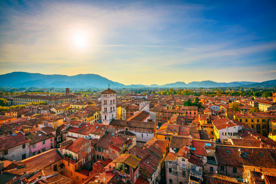 Aerial view of Lucca, Italy, showcasing the cityscape and the prominent San Michele Cathedral in Tuscany